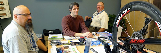 Men meeting in conference room.